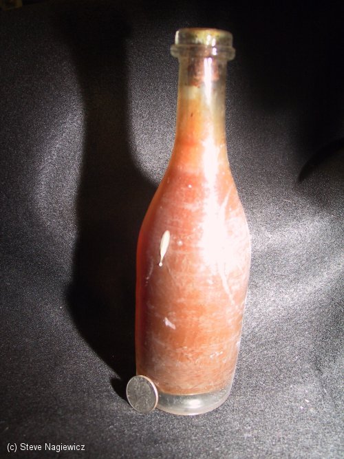 Hand-blown beer bottle