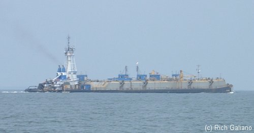 tugboat pushing a barge